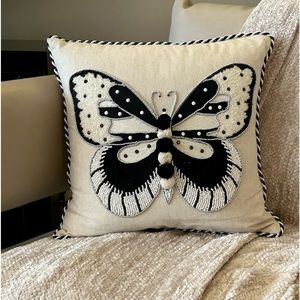 MacKenzie-Childs 16” square embellished butterfly pillow.
